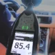 Sound Level Meter in car on highway