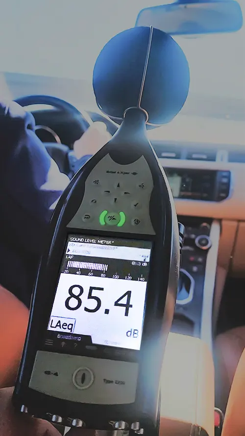 Sound Level Meter in car on highway